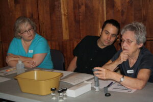 Citizens learning how to monitor water quality at one of our trainings.